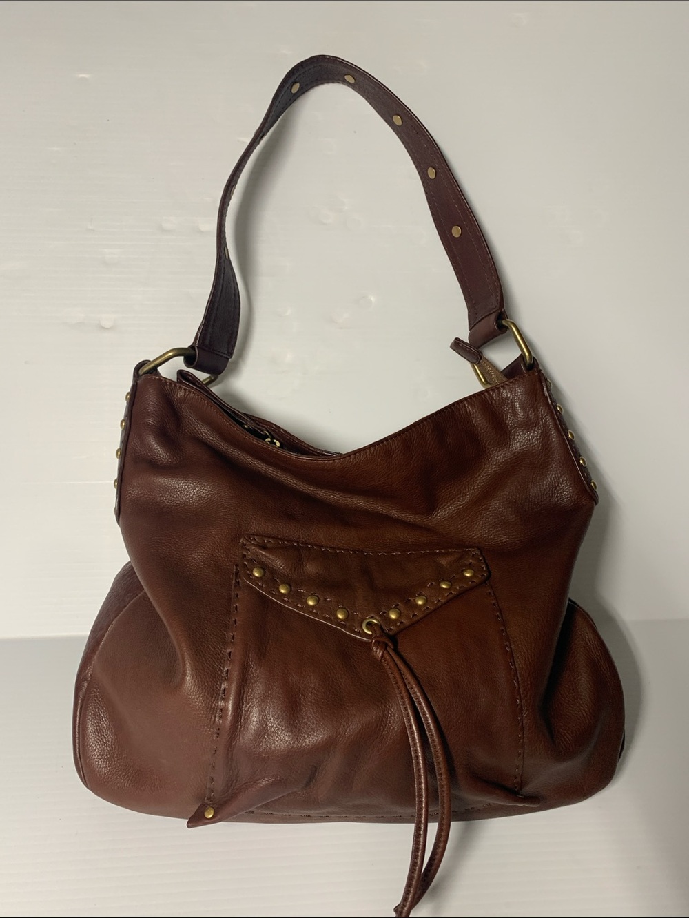 Brown Leather Hobo Bag with Tassel Accent